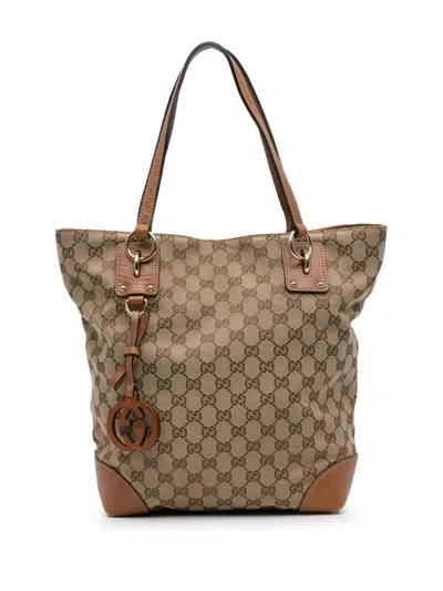 Pre-owned Gucci 2016-2025 Medium Gg Canvas Gg Charm Tote Bag In Brown