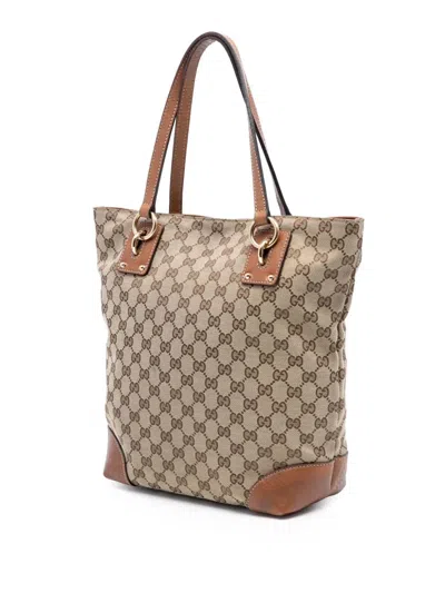 Pre-owned Gucci 2016-2025 Medium Gg Canvas Gg Charm Tote Bag In Brown
