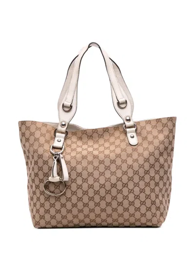 Pre-owned Gucci 2016-2025 Medium Gg Canvas Icon Bit Tote Bag In Brown