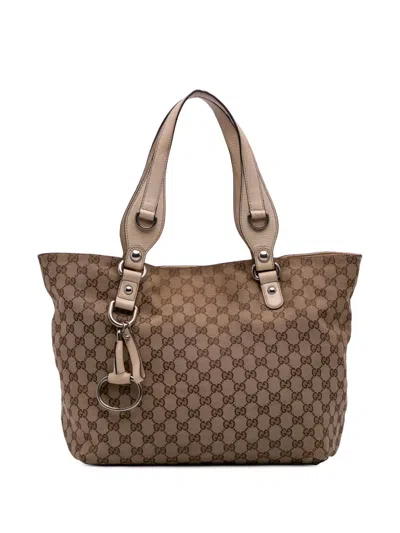 Pre-owned Gucci 2016-2025 Medium Gg Canvas Icon Bit Tote Bag In Brown