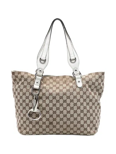 Pre-owned Gucci 2016-2025 Medium Gg Canvas Icon Bit Tote Bag In Brown