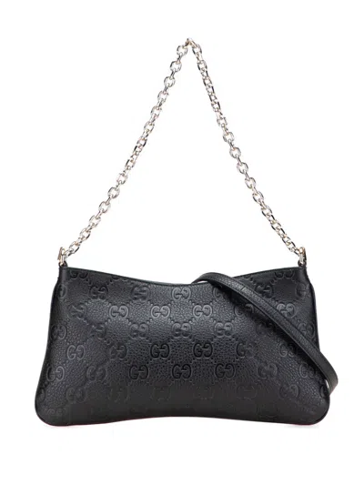Pre-owned Gucci 2016-2025 Medium Gg Emblem Embossed Leather Shoulder Bag Satchel In Black