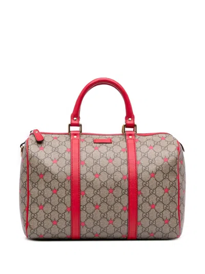 Pre-owned Gucci 2016-2025 Medium Gg Supreme Stars Joy Boston Bag In Brown