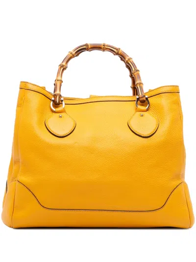 Pre-owned Gucci 2016-2025 Medium Leather Bamboo Diana Tote Bag In Yellow