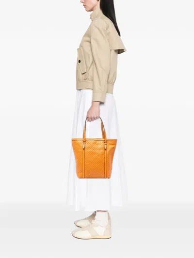 Pre-owned Gucci 2016-2025 Medium Microssima Nice Tote Bag In Orange