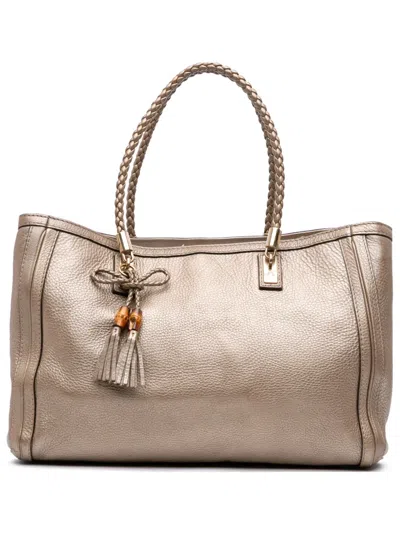 Pre-owned Gucci 2016-2025 Metallic Grained Leather Bella Tote Bag In Gold