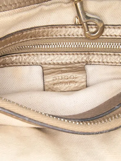 Pre-owned Gucci 2016-2025 Metallic Grained Leather Bella Tote Bag In Gold