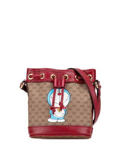 Pre-owned Gucci 2016-2025 Micro Gg Supreme Doraemon Bucket Bag In Brown
