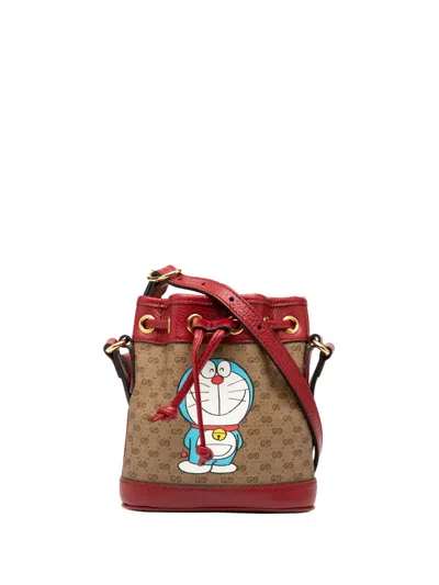 Pre-owned Gucci 2016-2025 Micro Gg Supreme Doraemon Bucket Bag In Brown