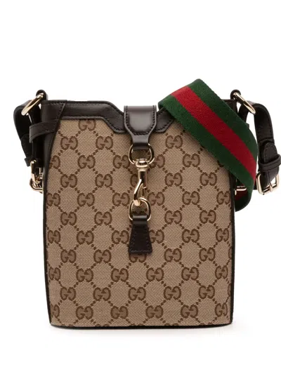 Pre-owned Gucci 2016-2025 Mini Gg Canvas Web Bucket Bag In Brown