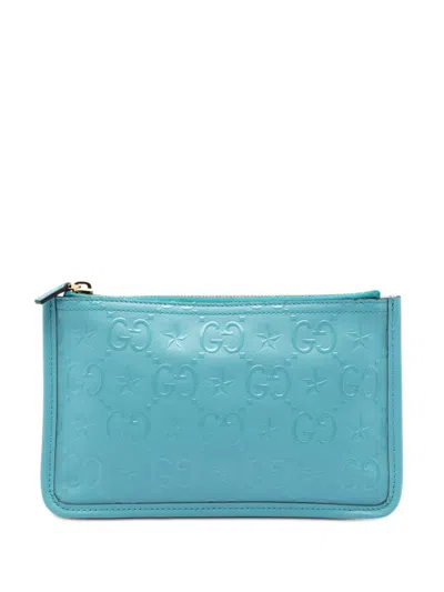 Pre-owned Gucci 2016-2026 Gg Star Embossed Leather With Chain Pouch In Blue