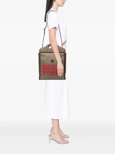 Pre-owned Gucci 2016-2026 Gg Supreme Web Tiger Satchel In Brown