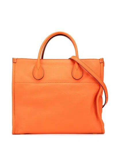 Pre-owned Gucci 2016-present Small Pebbled Calfskin Logo Convertible Tote Satchel In Orange