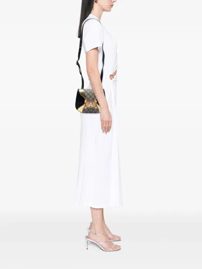 Pre-owned Gucci 2016-2025 Gg Supreme Osiride Crossbody Bag In Brown