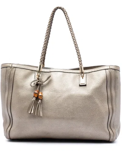 Pre-owned Gucci 2016-2025 Metallic Grained Leather Bella Tote Bag In Gold