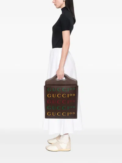 Pre-owned Gucci 2016-2026 100th Anniversary Textured Calfskin Logo Convertible Tote Bag In Brown