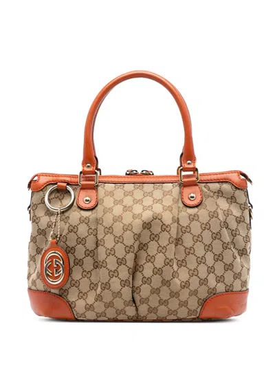 Pre-owned Gucci 2016-2026 Gg Canvas Sukey Satchel In Orange