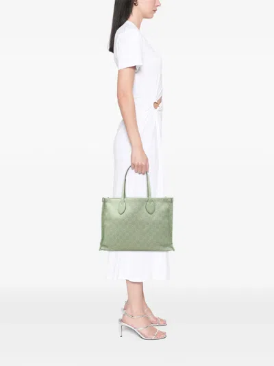 Pre-owned Gucci 2016-2026 Large Gg Denim Ophidia Tote Bag In Green