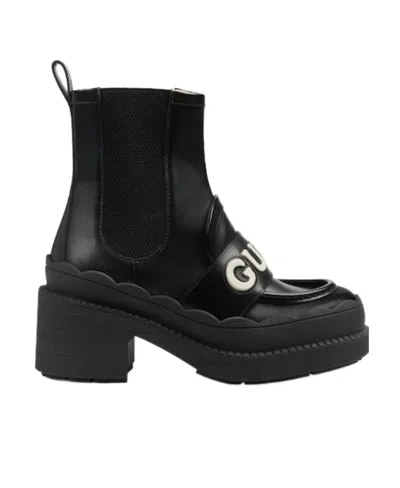Gucci 60mm Logo-lettering Leather Boots In Black