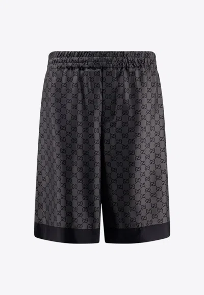 GUCCI ALL-OVER GG MOTIF BERMUDA SHORTS