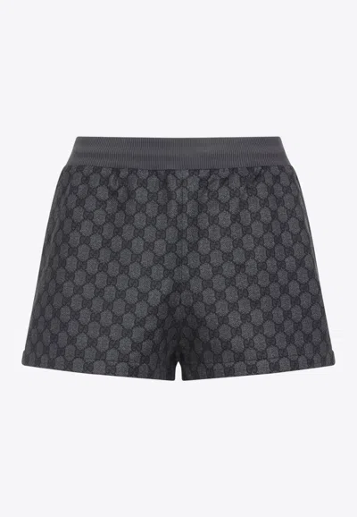 GUCCI ALL-OVER LOGO JERSEY SHORTS