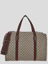 Gucci Logo Duffle Bag In Brown