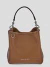Gucci Gg Emblem Leather Bucket Bag With Frontal Logo In Brown