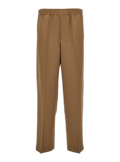 Gucci Beige Tapered Leg Trousers In Technical Fabric Man In Cream