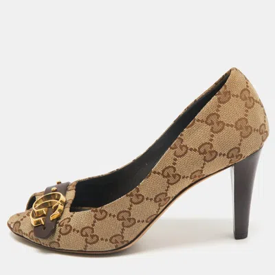 Pre-owned Gucci Beige/brown Gg Canvas And Leather Logo Peep Toe Pumps Size 37.5
