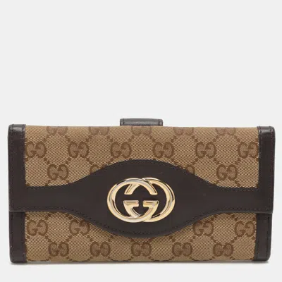Pre-owned Gucci Beige/brown Gg Canvas And Leather Trifold Flap Wallet
