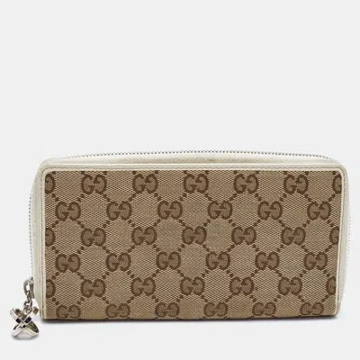 Pre-owned Gucci Beige/cream Gg Canvas And Leather Zip Around Wallet