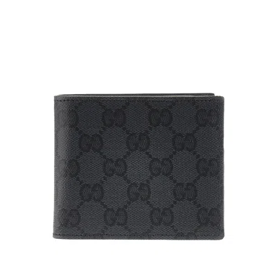 Gucci Bi-fold Wallet With Lacquered Gg Detail In Black