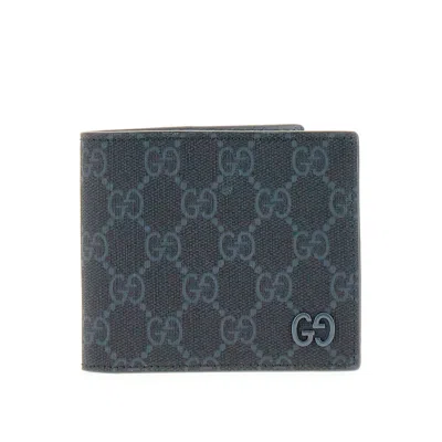 Gucci Bi-fold Wallet With Lacquered Gg Detail In Purple