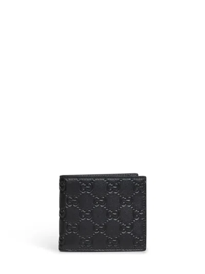 GUCCI BLACK GG EMBLEM BI-FOLD WALLET