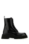 Gucci Thea Lug Sole Boots In Black Leather