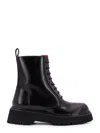 Gucci Thea Lug Sole Boots In Black Leather In Black