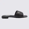 Gucci Meg Flat Sandals With Engraved Signature Gg Logo In Black