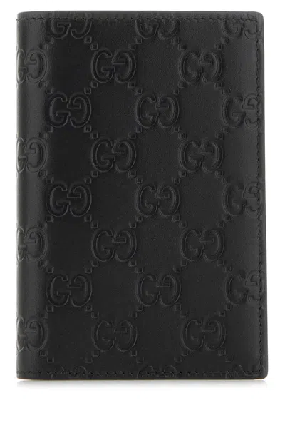 Gucci Black Leather Gg Emblem Passport Holder