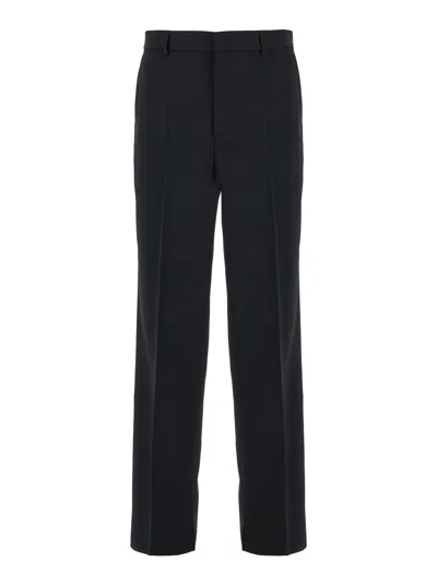 GUCCI GUCCI MEN BLACK STRAIGHT PANTS WITH TONAL LOGO LETTERING IN WOOL MAN