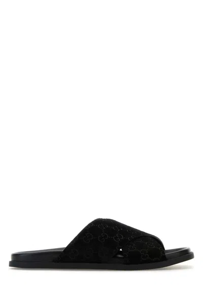 Gucci Men Leather Slides With All-over Gg Motif In Black