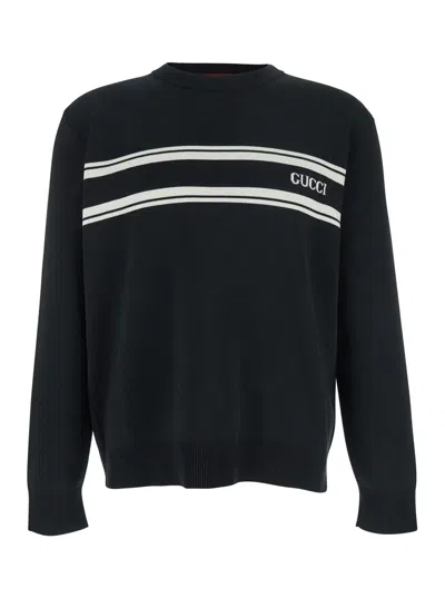 GUCCI BLACK SWEATER WITH LOGO LETTERING ON THE FRONT IN WOOL MAN