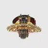 Gucci Black/gold Crystal Bee Bracelet W/tiger Head And Grg Elastic Band In Gold/black