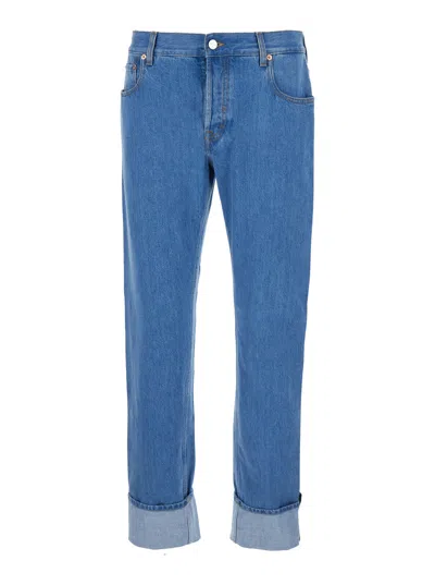 Gucci Blue Jeans With Logo Patch On The Rear And Web Turn-up Hem In Denim Man