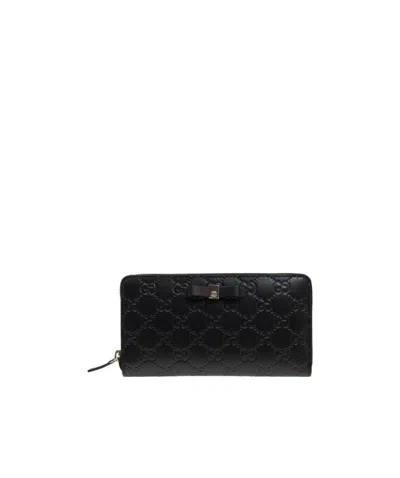 Gucci Bow Zipper Wallet In Black