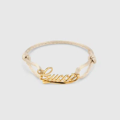 Gucci Bracelet Cordon À Inscription In Gold