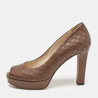 Pre-owned Gucci Brown Monogram Leather Peep Toe Pumps Size 37.5