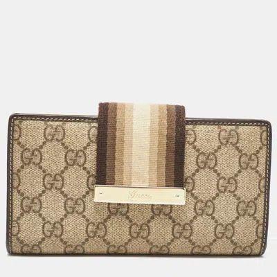 Pre-owned Gucci Brown/beige Gg Canvas And Leather Web Flap Continental Wallet