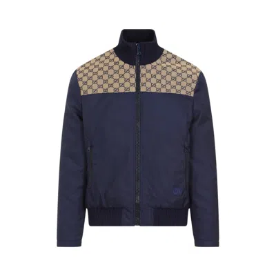 Gucci Monogram-panel Funnel-neck Shell Jacket In Blue