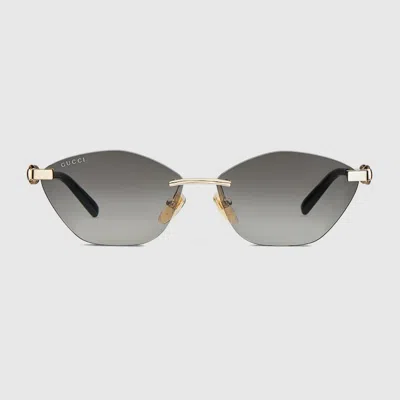 Gucci Cat Eye Frame Sunglasses In Gold