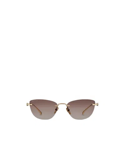 Gucci Cat-eye Sunglasses In Gold